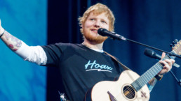 Ed Sheeran on stage with guitar